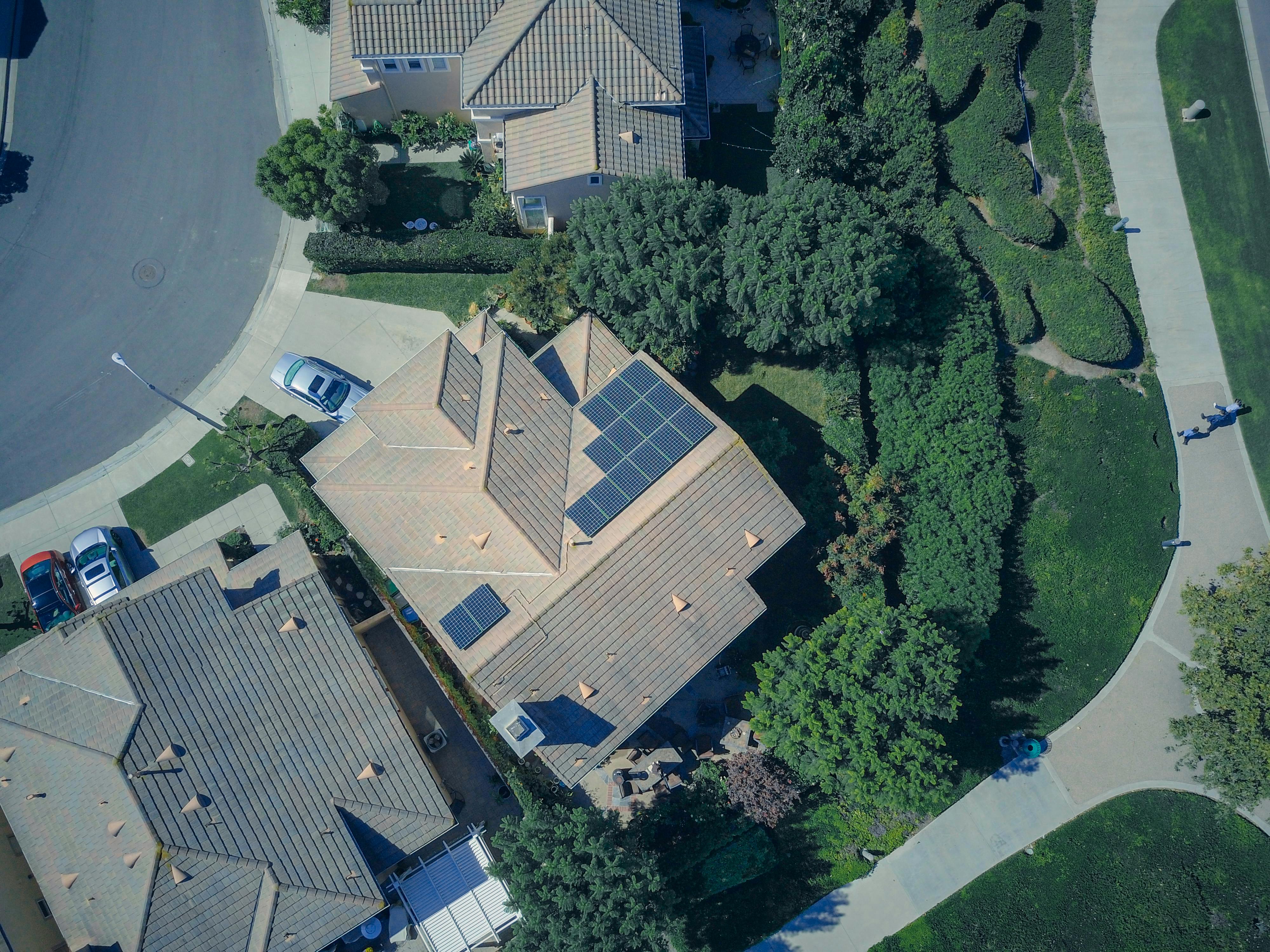 Aerial view of suburban neighbourhood with solar panels
