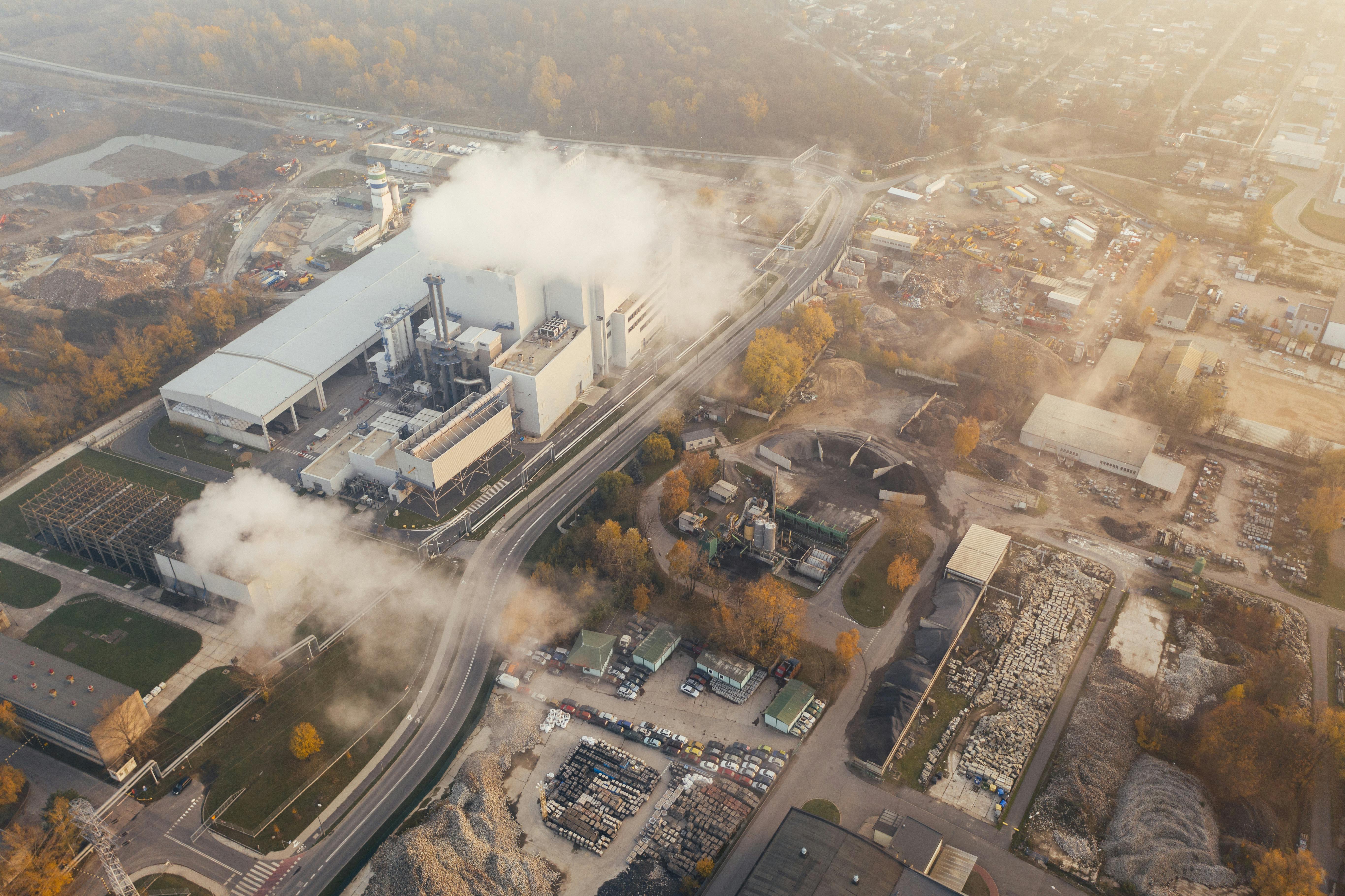 Aerial view of industrial facility and infrastructure — climate adaptation